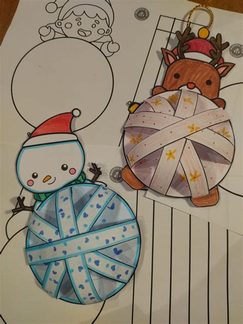 Palline di Natale di carta con motivi a tema neve e glitter