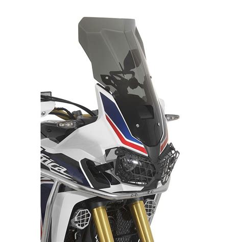 Dettaglio della carenatura anteriore della Honda Africa Twin con parabrezza regolabile
