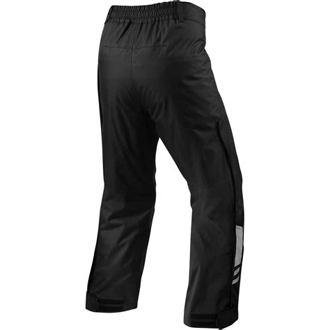 schema di pantaloni antipioggia con zip lungo la gamba
