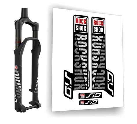 Dettaglio di una forcella Rock Shox con adesivi personalizzati colorati