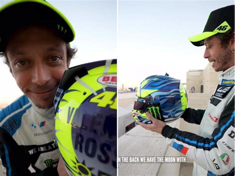 Valentino Rossi in moto con il suo casco iconico