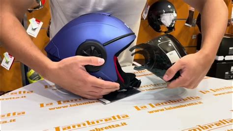 Meccanismo di sgancio rapido della visiera del casco