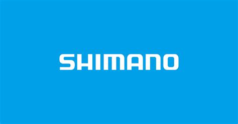Logo Shimano con sfondo di biciclette