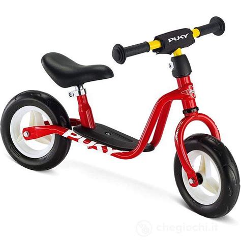 bambino su bici senza pedali Puky
