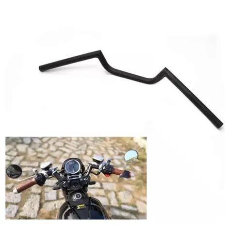 Immagine: layout classico Cafe Racer con manubrio basso e sella monoposto