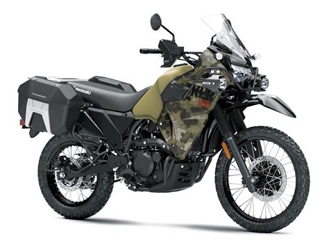 Kawasaki KLR650 traversing a dusty mountain trail